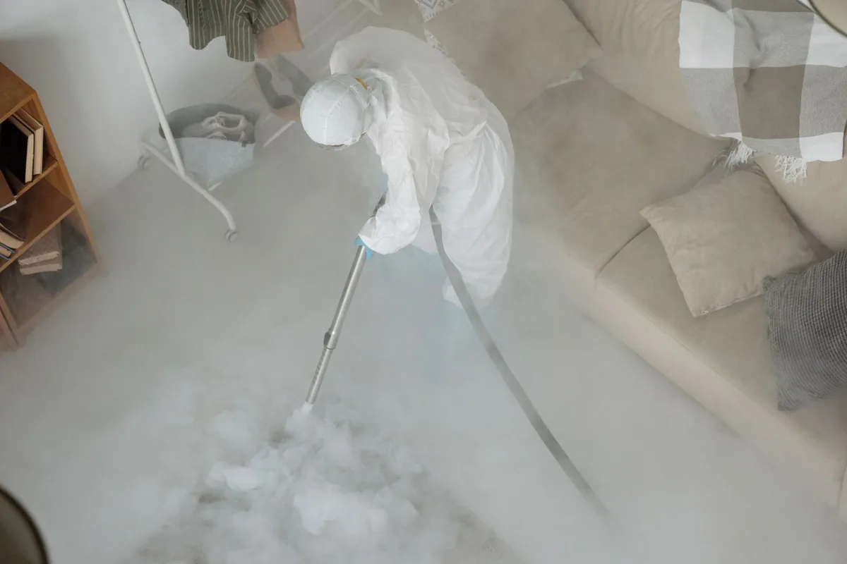 Biohazard cleanup technician in protective equipment, Woodstock, Portland, OR